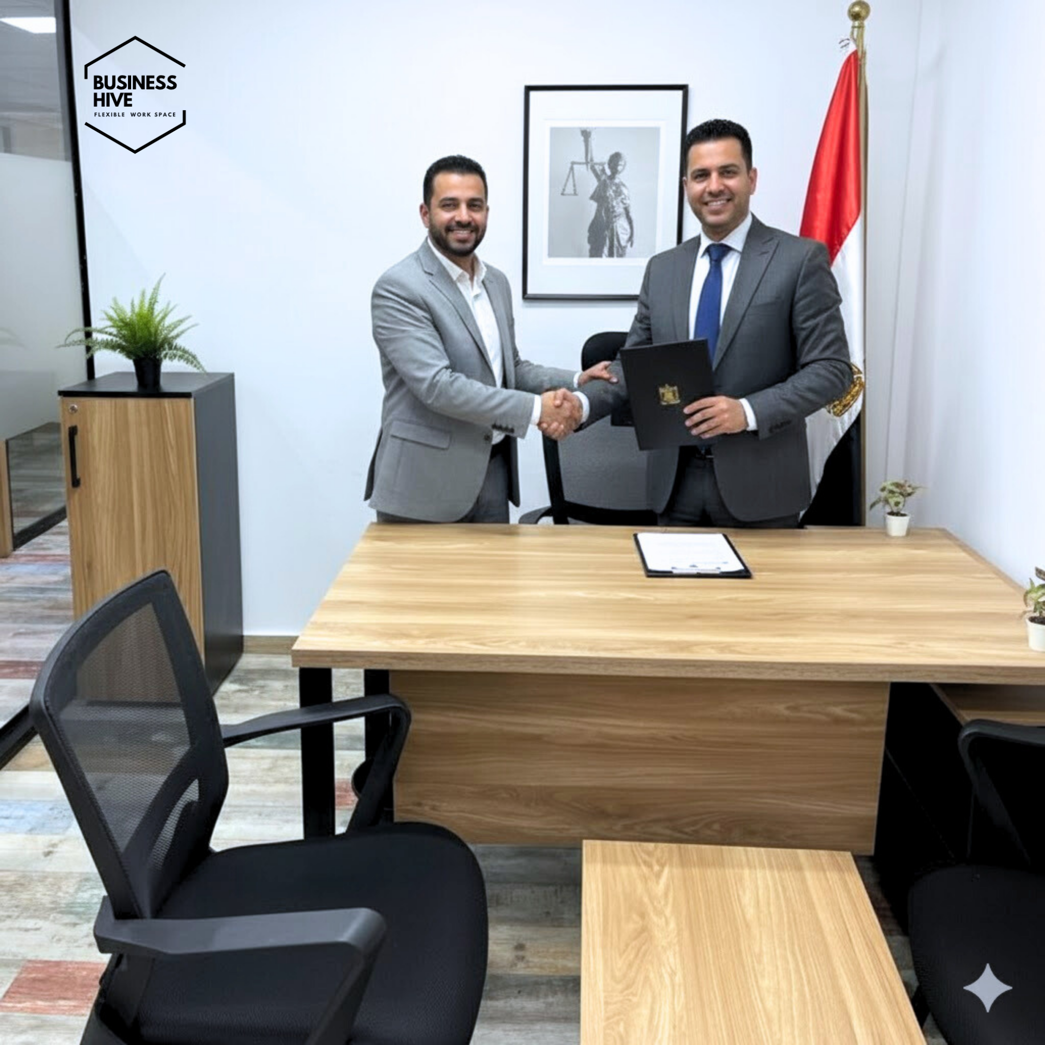 Formal handshake in a Business Hive setting connected to Deal N' Run brand operations