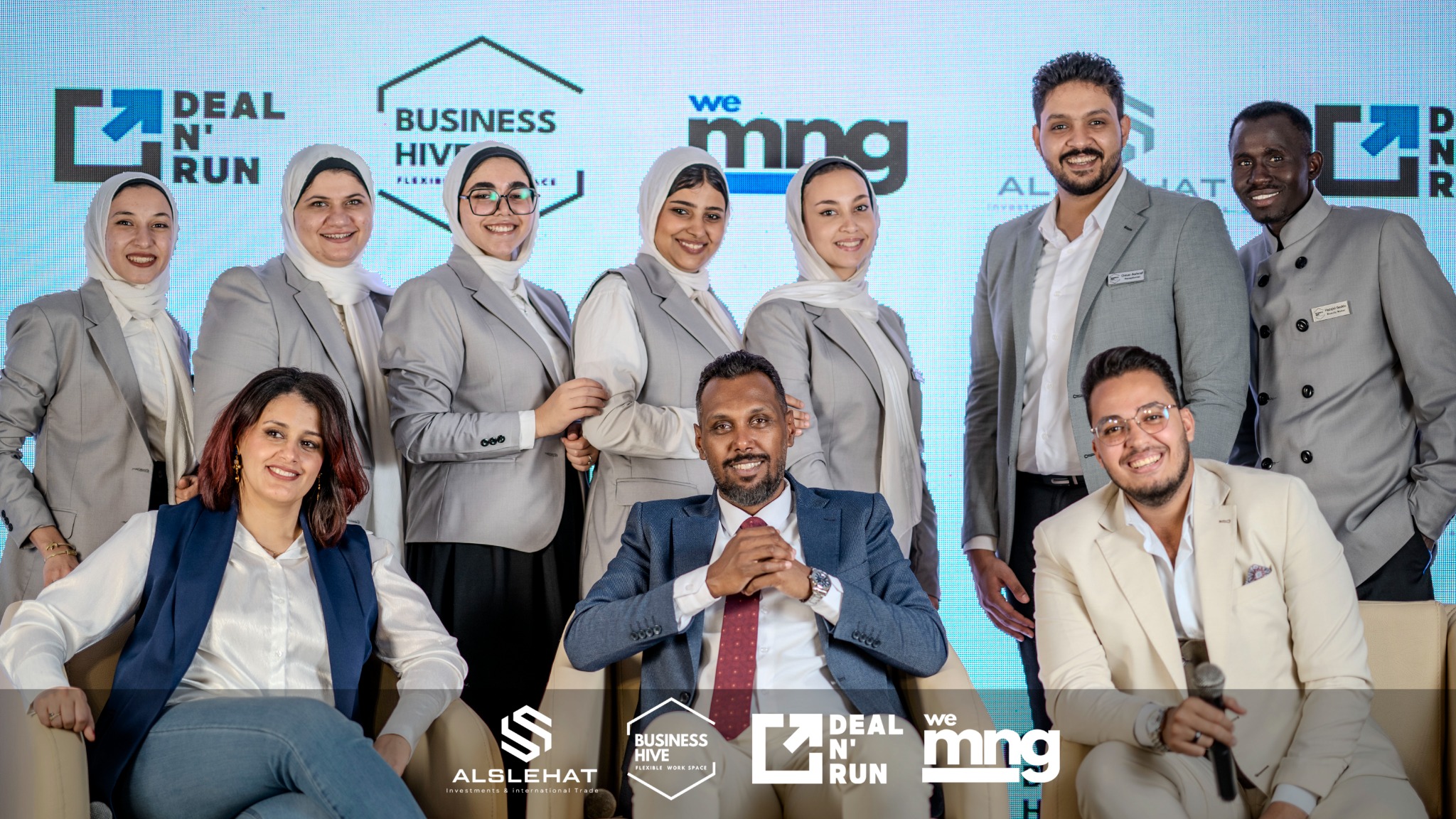 Deal N' Run team and brand representatives in a professional business event